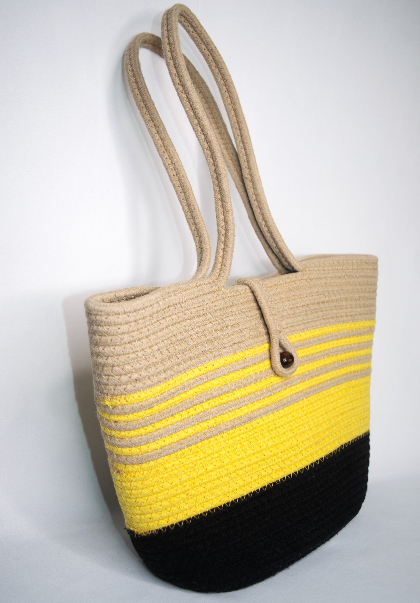 Trendy beige, yellow, and black tote bag made from cotton rope