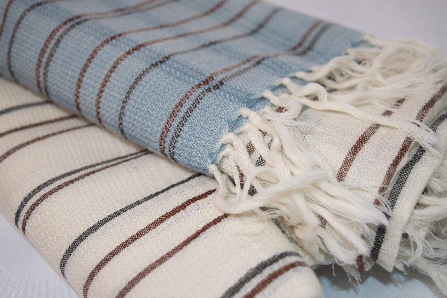 Winter woolen scarf in blue and cream with fringe finish