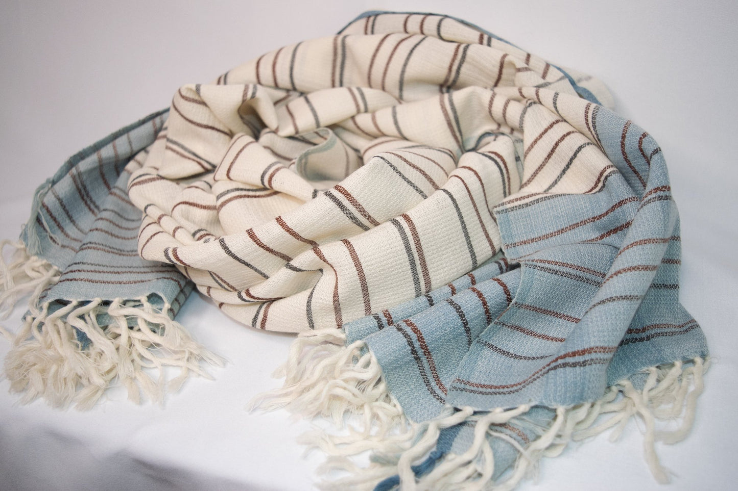 blue and cream striped wool scarf with fringe accents
