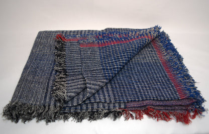 Stylish plaid cotton wrap in black, blue, and red tones